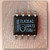 Black SO-8 chip on a light crinkled backdrop, printed TL431AC, J0471, 718n and THAILAND