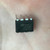 Black DIP-8 plastic package marked "ST KOREA / LM358N / H7W705." Eight leads visible, clean with no corrosion.