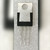 Back of the TO-220 showing bare metal tab, mounting hole, three unbent leads.