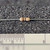 Close-up of Xicon 291-10 10 Ohm carbon film resistor showing color code bands.