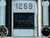 Detail of molded 1269 marking and Pomona name between bright silver-coloured banana plug shanks