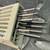 HP 10024A IC clip angled top view with ribbed housing and fanned nickel probe pins