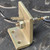 Rear view of Motorola 1N2984B stud-mount diode attached to bracket with nut and solder lug.