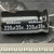 Opposite sleeve face showing KL(K) series marking, 85 C rating, and negative polarity stripe