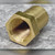 Same brass Vulcan orifice from the inlet end, female threads and hex flange visible