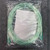 Full sealed bag of Bantex 3400-7 seven foot green oxygen tubing, heat-sealed top seam, back view