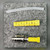 3M 8100-YS ST connector unpacked for photography beside yellow boot and clear sleeve