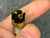 Terminal end view of Cole Hersee 8706 switch showing two brass screw terminals on black base