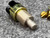 Close-up angled view of 8706 switch threaded mounting bushing, gold chromate housing and metal plunger