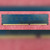 Full front view of Hynix 1GB DDR3 DIMM with white spec label and eight DRAM chips