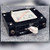 Angled view of CA1-B2-34-630-311-C breaker with white 30A toggle handle and Phillips mounting screws