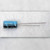 Side profile of Xicon electrolytic capacitor showing 25V 100uF markings and radial leads.