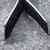 Macro view of black hook face and softer black loop face of Velcro strip