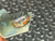 Angled view of Ohmite Type AB body label and three terminals on bracket