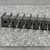 Underside of Curtis T37040-16-0 showing molded CURTIS and 37 markings beside flat solder lug tabs