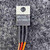 Close-up of LM7808CT TO-220 body marking, National logo, lot code and sleeved leads