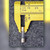 51NM glass fuse held in calipers showing an approximate 5 mm diameter.