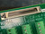 Close-up of 68-pin high density connector J69 with gold contacts and metal shell