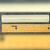 Isolantite Type 348 insulator beside inch ruler showing approximately 6 inch overall length