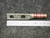 Back side of lug with rule showing barrel color band and tin plating patina