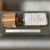 Burle 4856 PMT with factory test label and 14 pin base shown beside steel ruler