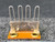 Federal Pacific F4.0 thermal overload heater element, a silver metallic Ushaped electrical component featuring four distinct heating loops. It is mounted on an orangebrown insulating base with two visible brass eyelet terminals. This industrial control circuit protection replacement part is designed for an overload relay and is shown in a clear, straighton view, highlighting its construction and connections.