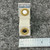 Square D AR-2.71 heater element upright with AR-2.71 marking stamped on the metal bracket face, ruler below.