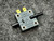 A World Magnetics pressure switch PSF100A from PartsMine.com, with visible "LOW" and "PRESSURE SENSOR" labeling, displayed on a gray textured background.