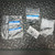 Overhead view of the Tektronix P6063B probe parts lot in labeled factory bags