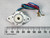Bottom view of 06-0028-AS bearing plate, rotor bore, gold female crimp terminals, ruler