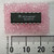 Motorola MC34060AP 14-pin DIP marked KEX9449 on pink antistatic foam beside millimeter ruler