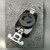 Black Turnlok receptacle face molded 15A-277V and P&S, mounting straps extended