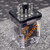 Three quarter view of KRPA-14DG-24 pin base, steel plate and orange inventory number on cover