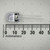 Side view of 10mm white LED against PartsMine millimeter ruler showing 10mm dome diameter