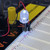 10mm water clear white LED lit on breadboard, powered from bench supply test leads