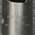 Close view of the stamped BOSTON Gear J125 marking and set screw on the hub