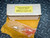 Birns Oceanographics Snooperette replacement lamp box with wrapped bulb on shop cloth