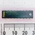 Top view of National Semiconductor 74ACT373PC IC in a DIP-20 package next to a millimeter ruler.