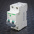 Schneider Multi 9 C60SP D 3A breaker M9F23203, angled view showing Merlin Gerin molding and barcode