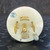 Front-facing view of the Hubbell HBL2521 Twist-Lock Plug 20A 277/480V 4P 5W Insulgrip from PartsMine.com, highlighting the arrangement of its metal prongs and molded specifications on the plug face.