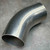 MKS 1002345WT200 stainless 45 degree buttweld elbow photographed at an angle on gray surface