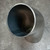 Looking down the open weld end of the stainless elbow, showing bore and thin wall