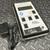 IL1400A radiometer photometer front three-quarter view with Archer AC adapter on diamond plate