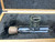 Close-up of the lamp side arm viewing tube and patinated metal screw base