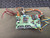 Simple Step SSQE SSQEXAO1PA-E stepper control board, top view with attached ribbon and power harness