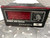 Front panel with red display window, 6-position channel selector, degrees C label