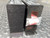 Side view of COM200 pair with small sealed hardware bag taped to one unit