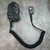 Full MSA 10030980 lapel mic assembly laid flat showing coiled cable and LOCK connector module