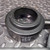 Volpi ring illuminator viewed from the mount side, knurled thumbscrew and stepped bore visible