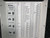 Detailed reference label visible with pin-signal mapping table and small wiring diagrams. Label text legible; no visible tears or damage to label.